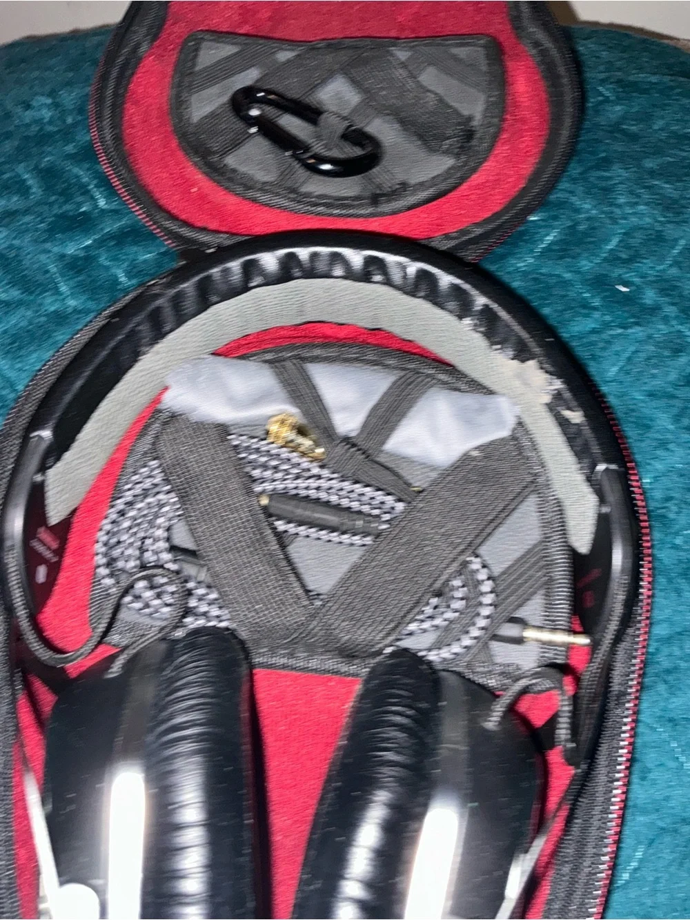 Compact Black Headphone Carry Case with Red Interior